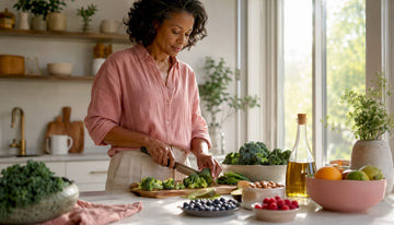 Woman chopping vegetables in kitchen