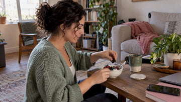 Woman pairing chocolate with a balanced snack