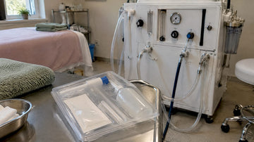 Enema kit beside colon hydrotherapy equipment