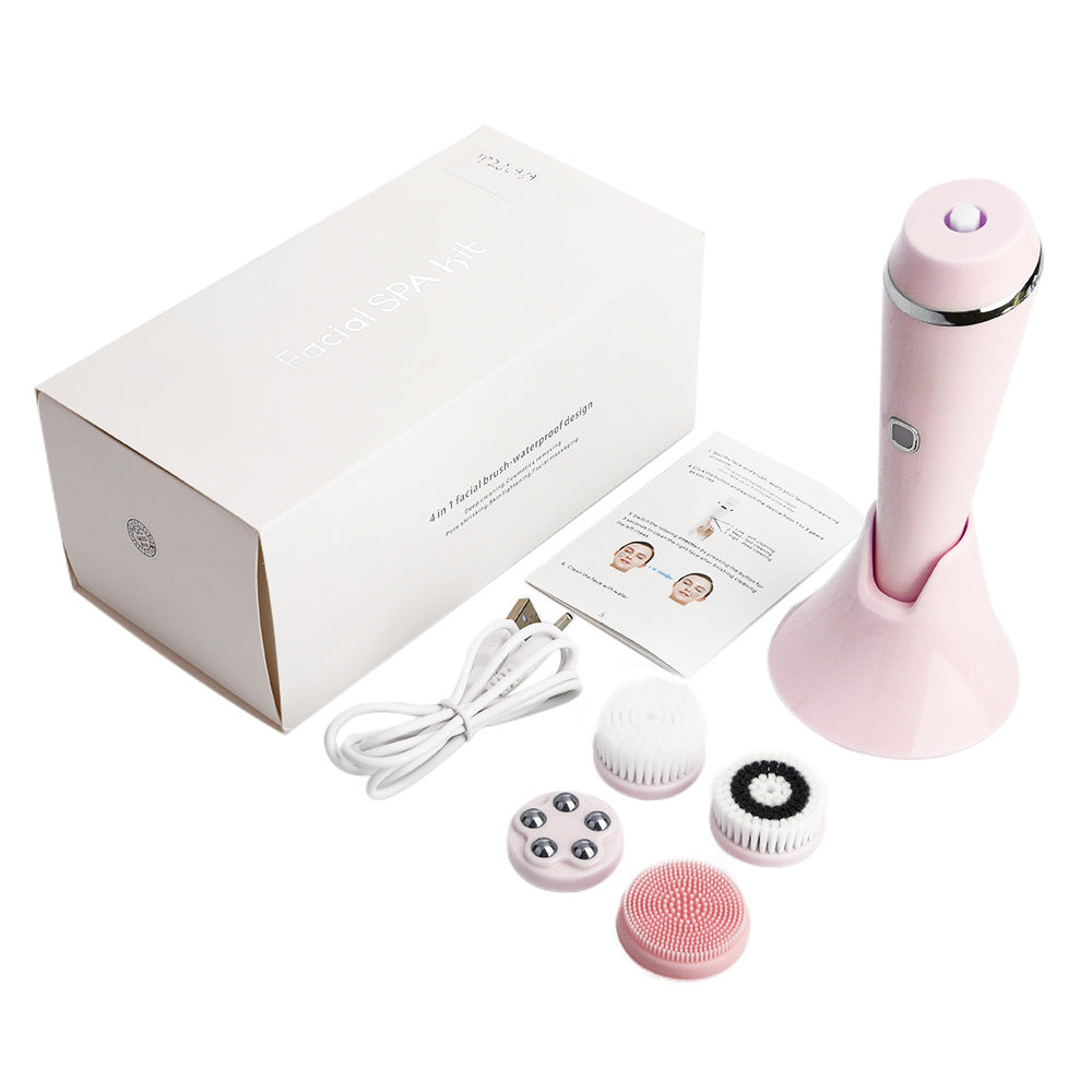 Pink electronic device with attachments and packaging on a white background