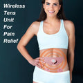 Woman wearing a wireless tens unit for pain relief on a dark background