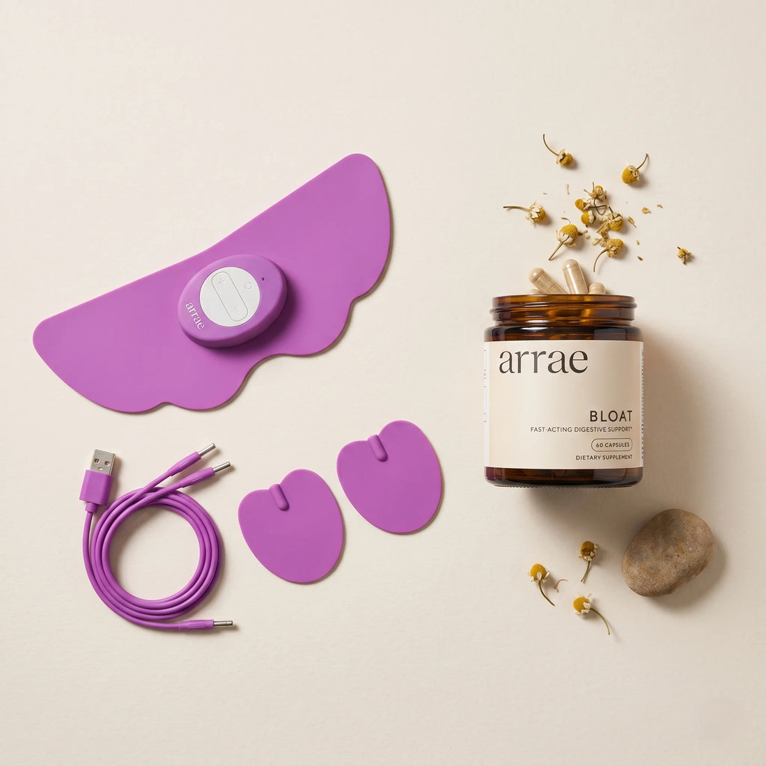 Arrae bloat product with purple electronic device and cable on a beige background